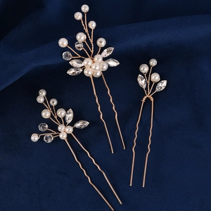 Three-piece bridal pearl hair pin set with crystals and gold wire for wedding hairstyles