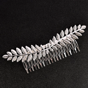 Elegant silver leaf hair comb bridal headpiece accessory with polished metal finish