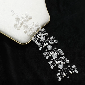 Handmade bridal hair vine with white pearls and silver floral wire for wedding hair styling