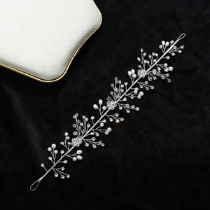 Handmade bridal hair vine with white pearls and crystals on silver wire for wedding hair styling