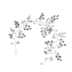 Silver bridal hair vine with white pearls and crystals in an elegant floral branch design