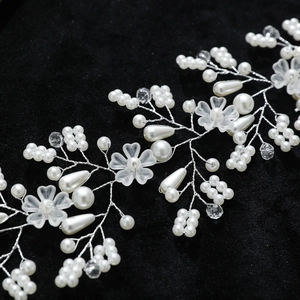 Elegant bridal hair vine with handmade white pearls, crystals and frosted flowers on silver wire
