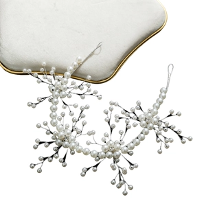 Elegant bridal hairband set with white pearls and silver floral wire for wedding hair styling