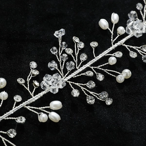 Handmade bridal hair vine with white pearls and crystals on silver wire for wedding hair