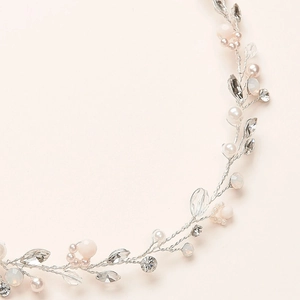 Handmade bridal hair vine with silver wire, white pearls, and sparkling crystals for weddings