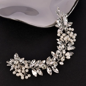 Exquisite bridal hair vine with sparkling rhinestones and white pearls on silver wire