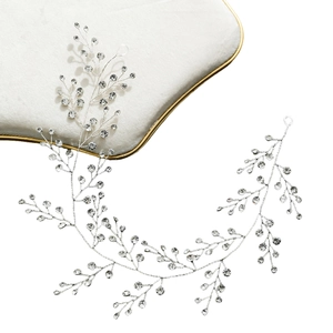 Elegant silver bridal hair vine with shimmering rhinestones and a flexible branch design
