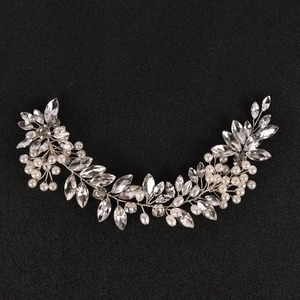 Elegant bridal hair band with silver leaves, faux pearls and sparkling rhinestones