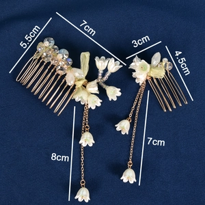Handmade lily of the valley bridal hair combs set with green bows and elegant tassels