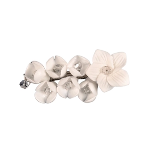 Handmade bridal hair clip with white ceramic flowers and sparkling crystal accents