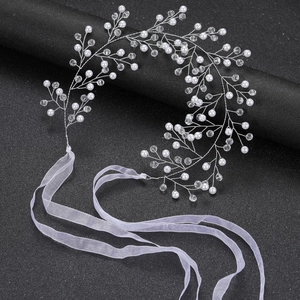 Elegant bridal hair vine with white pearls and crystals on silver wire with chiffon ribbons