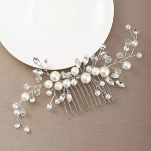 Elegant bridal hair comb with white pearls and crystals on silver vine structure