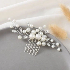 Handmade silver bridal hair comb with elegant white pearls and marquise crystals