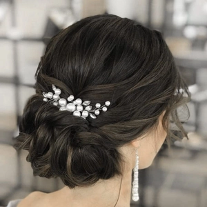 Handmade bridal hair comb with elegant white pearls and rhinestones in silver wire floral branch design
