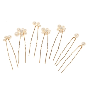 Set of 7 gold bridal hair pins with white pearls in elegant U-shaped design for weddings