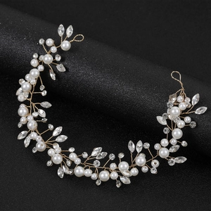 Elegant bridal hair vine with white pearls and marquise rhinestones on gold wire