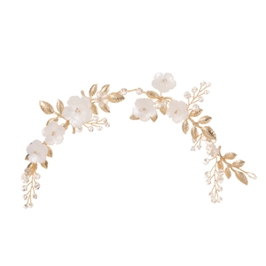 Elegant gold bridal hair vine with frosted white petals and sparkling crystal beads