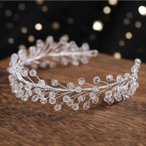 Elegant bridal hair vine with silver wire and faceted crystals for wedding styling
