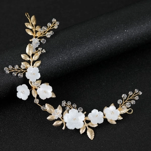 Elegant gold flower bridal headpiece with white shell petals and crystal beads