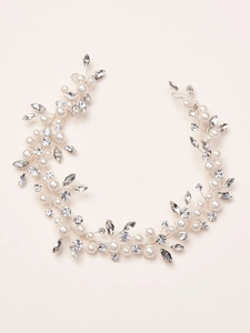 Elegant bridal hair vine featuring white pearls and marquise rhinestones in silver finish
