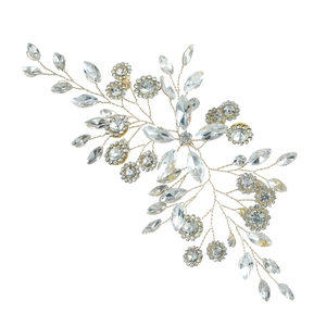 Macro shot of silver wire bridal hair piece with marquise crystals and rhinestones