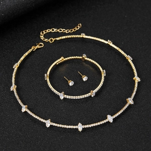 Exquisite gold bridal jewelry set with sparkling crystals and marquise zircon stones