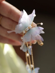 Elegant purple organza butterfly hair clip with gold fringe tassels and pearls