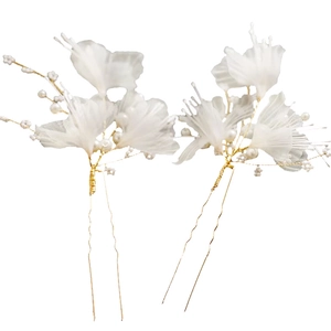 Elegant bridal hair pins with white fabric flowers and pearls on golden U-shaped pins