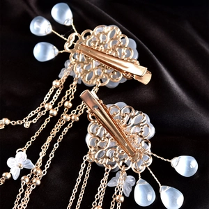 Barrettes à cheveux de style ancien avec glands dorés, gouttes bleues et papillons
