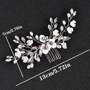 Handmade white pearl and crystal floral hair comb with silver metal prongs for weddings
