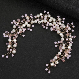 Handmade bridal headband with white pearls and pink crystals on gold wire vine over black leather