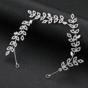 Elegant silver leaf bridal headband with sparkling rhinestones and marquise crystals