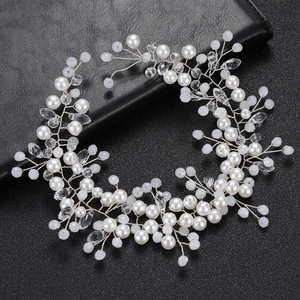 Handmade bridal headband with white pearls and crystals on silver vine structure