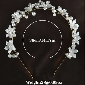Detail view of handmade flower pearl headband with gold wire and size specifications