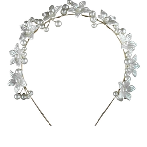Elegant floral headband with white pearls and gold wire for wedding or party hairstyles