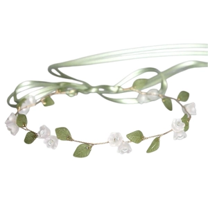 Handmade lily of the valley floral headband with white flowers and green leaves for brides