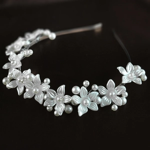 Elegant white floral headband with lustrous pearls for bridal wedding hair accessories