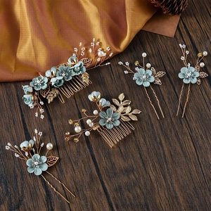 Floral bridal hair accessory set with blue fabric flowers and pearls on gold pins