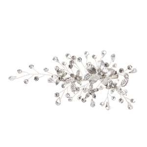 Handmade bridal hair clip with silver leaves and rhinestones for wedding ceremonies