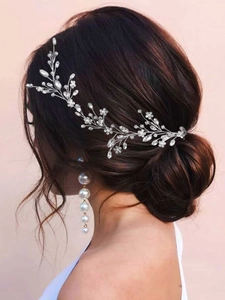 Silver bridal hair vine with marquise crystals and long elegant pearl drop earrings