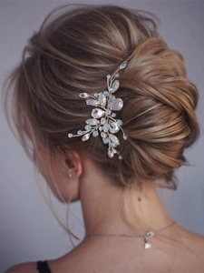 Bridal U-shaped hair pin with opal crystals and silver floral design on elegant updo