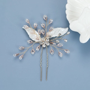 Épingle à cheveux en U dorée avec feuilles en résine blanche et branches en cristal rose
