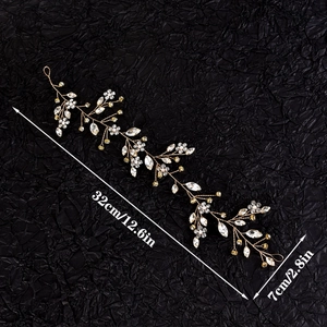 Detailed view of handmade bridal hair vine with crystals and flower design, 32cm length