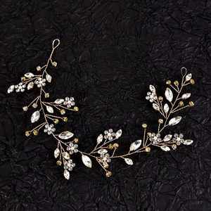 Handmade bridal hair vine with gold wire, crystals, and pearls for wedding parties