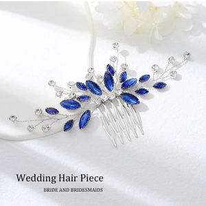 Detail of silver wedding hair comb with sapphire blue rhinestones and crystal branches