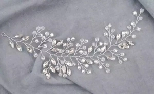 Silver bridal headband with clear crystal leaves and white pearls in vine design