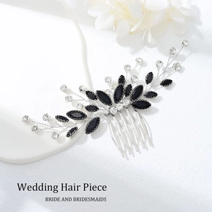 Macro shot of silver wedding hair comb with black marquise stones and clear crystals