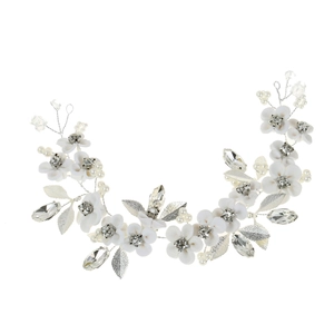 Silver bridal hair vine with white ceramic flowers, crystals and faux pearls on white