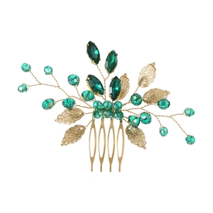 Handmade bridal hair comb with emerald green crystals and golden leaf accents