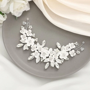 Handmade bridal hair vine with white clay flowers, silver leaves and pearl accents